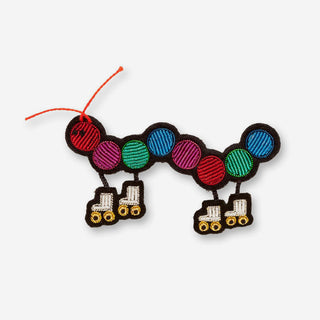 Caterpillar on Wheels brooch
